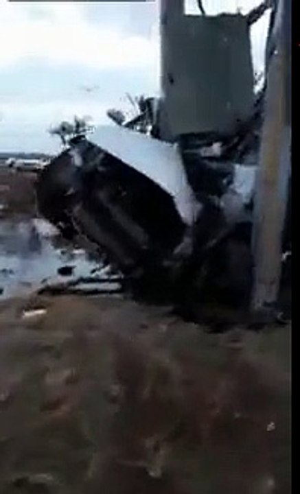 OMG...How did the car get wrapped round a pole?