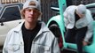 Justin-Bieber-models-denim-jacket-as-hesteps-out-of-eye-popping-turquoise-Lamborghini-in-Los-Angeles