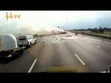 불길에 휩싸인 차량에서 인명 구한 용감한 트럭 운전사