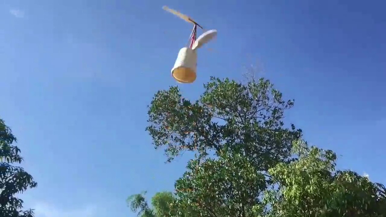 Make Home made Rubber Band Toy Helicopter from wasted plastic ice-creem cup.