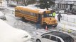 School Bus Driver Removes Dangling Power Line, Traffic Cones and Caution Tape From His Way