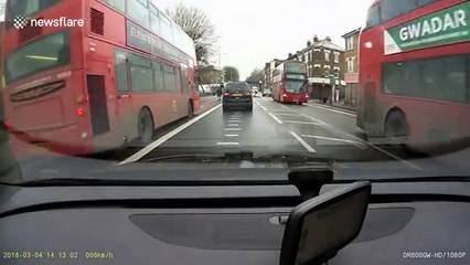 London man causes hold-up by dancing in front of red double-decker bus