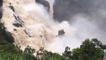 Flooded Barron Falls gushes after heavy rainfall in Queensland