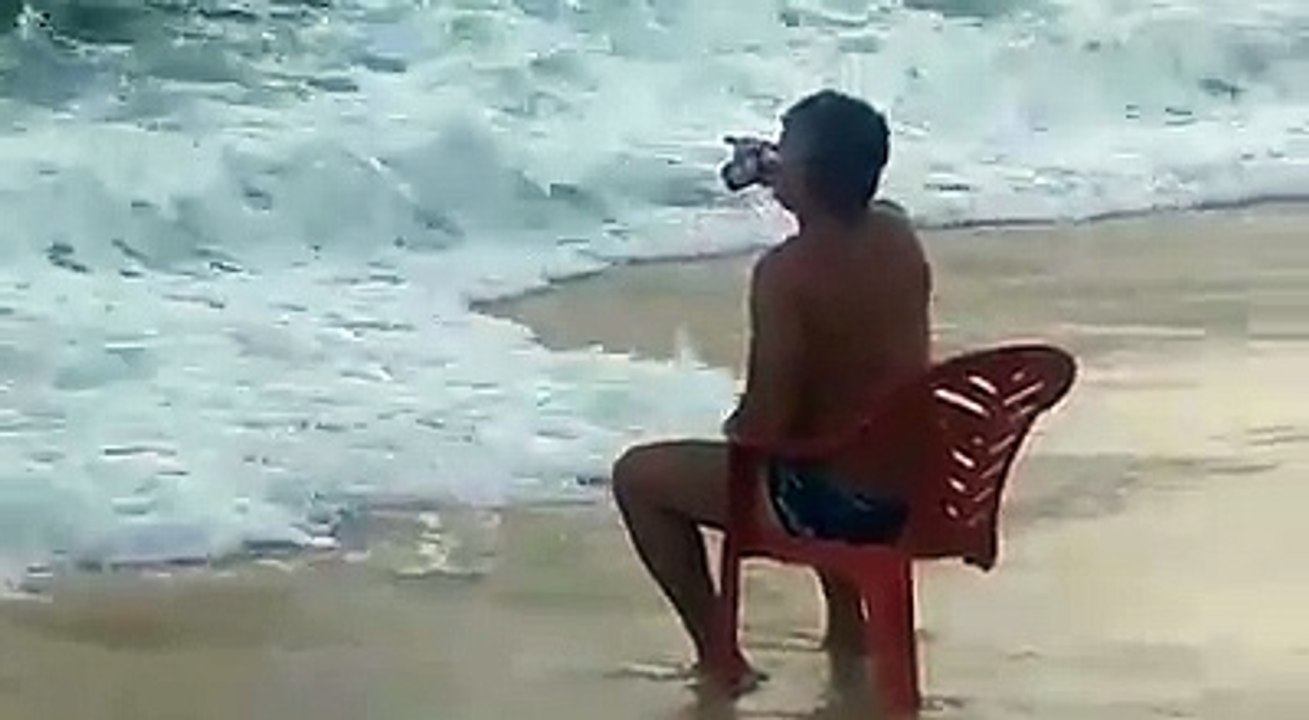 man compilation under wave