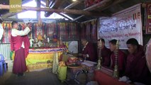 Nepali monks take up running to rebuild homes destroyed by 2015 earthquake