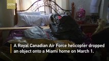 Canadian air force life raft crashes through Miami woman's roof