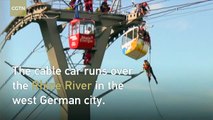 German firefighters evacuated about 100 passengers from a cable car