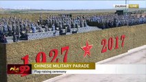 Exclusive: Xi singing the national anthem with the tri-service military forces at parade