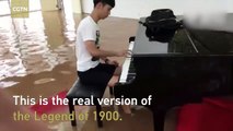 Video of submerged student playing piano on flooded campus goes viral