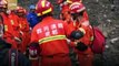 Footage: Rescue team found a body buried under the rubble of Sichuan massive landslide