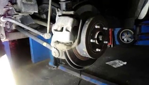 How to replace the rear brakes and rotor on a Toyota
