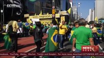 Opponents, supporters of Rousseff take to the streets, express support and condemnation