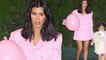 Mommy and me! Kourtney Kardashian shows off toned legs in matching pink mini dresses with daughter Penelope as they leave Khloe's baby shower.