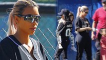 A League Of Their Own! Kim Kardashian rocks 'Calabasas Peaches' jersey for softball game with the family as Saint and North play cheerleaders.