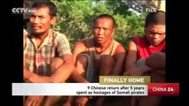 Nine Chinese return home after five years as hostages of Somali pirates