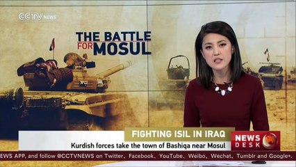 Kurdish forces capture the town of Bashiqa near Mosul