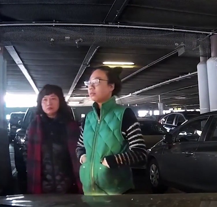Woman stood in parking lot to reserve it...WTH??