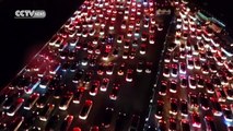 Back to work: Thousands of vehicles stuck in Beijing highway gridlock