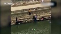 Man dives into river, saves drowning woman