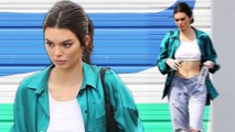 She's ripped! Kendall Jenner flaunts her flat abs in slashed white vest and shimmering silk shirt as she heads home from photoshoot.