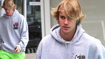 Downcast Justin Bieber grabs food to go solo in West Hollywood... after Selena Gomez ends romance because it 'upsets her mother'.