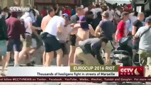 EuroCup soccer fans clash with riot police in Marseille