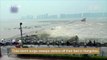 Footage: Tidal storm surge sweeps visitors off their feet in Hangzhou