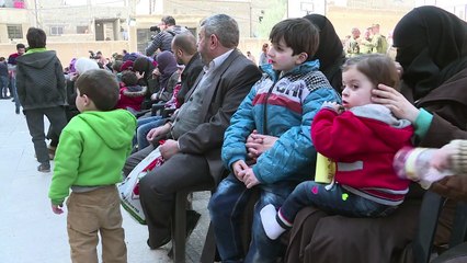 Civis evacuados em Ghuta