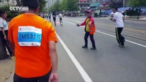 Dozens of Dalian Marathon runners collapse