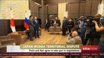 Putin and Abe agree to take part in talks on disputed islands