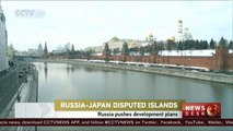 Russia pushes military plans on disputed islands