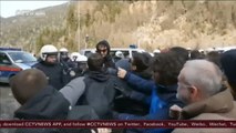 Austrian police clash with people protesting border closures