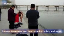 Footage: hero saves man from drowning, quietly walks away