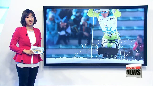 N. Korea's Ma Yu-chol and Kim Jong-hyon compete in 1.1 km sitting sprint in cross-country