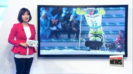 N. Korea's Ma Yu-chol and Kim Jong-hyon compete in 1.1 km sitting sprint in cross-country