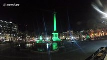 Trafalgar Square lit up green ahead of St Patrick's Day