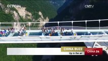 Tourists took selfies at Zhangjiajie's glass bridge