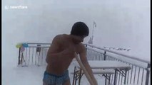 Naked man shovels snow in -10C at Italian resort