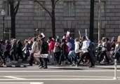 Thousands of Students March Past Trump International Hotel in Washington DC