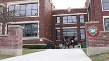 Students in Salt Lake City walk out the door to protest gun violence