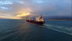 Drone films tanker ship sailing into dramatic Northern Ireland sunset