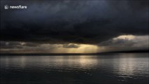 Gorgeous time-lapse of clouds and sunbeams over Northern Ireland lake