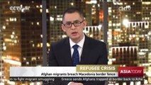 Refugee Crisis: Afghan migrants breach Macedonia border fence