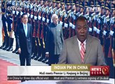 Modi meets Premier Li Keqiang in Beijing
