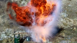 Dropping a Can of Liquid Oxygen Into Burning Oil