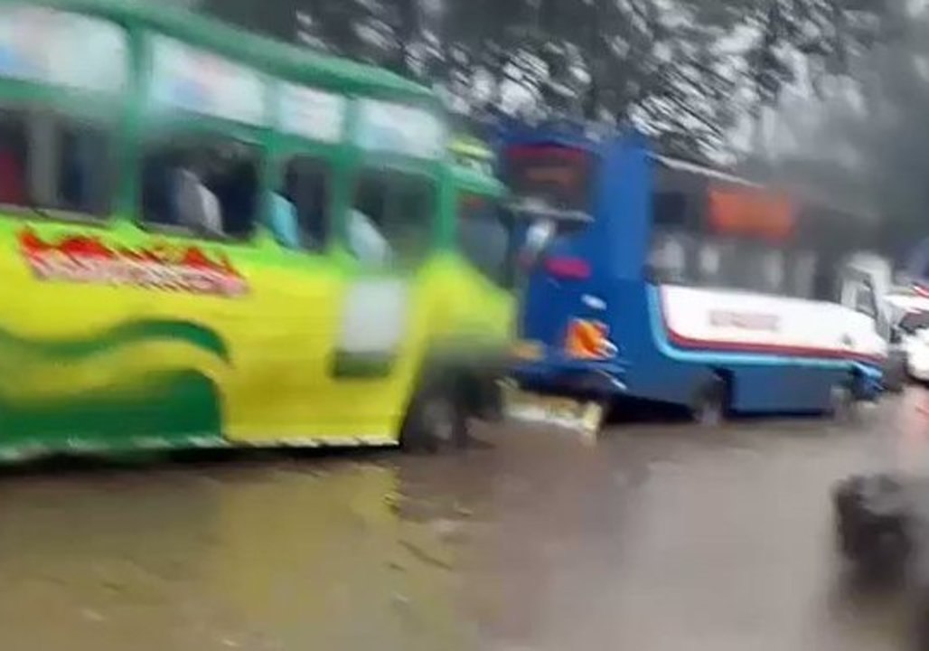 Cars Move Through Flooded Streets During Rush Hour Flooding in Nairobi