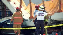 Rescue workers arrive on site after Miami bridge collapses