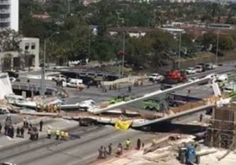 Cleanup Crews at Site of FIU Pedestrian Bridge Collapse