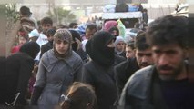 Thousands flee last rebel enclave near Syrian capital Damascus