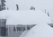 Man Skis Off Roof Into Deep Powder in Alpine Meadows